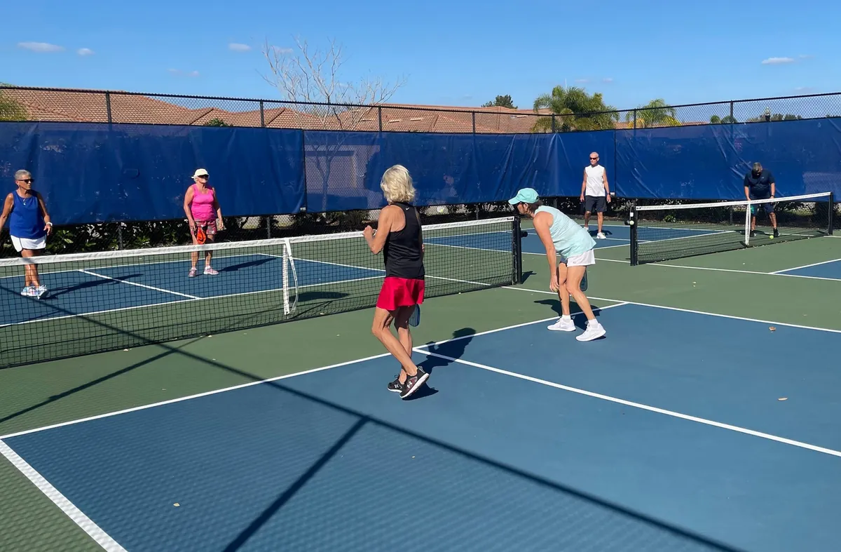 Residents playing pickleball